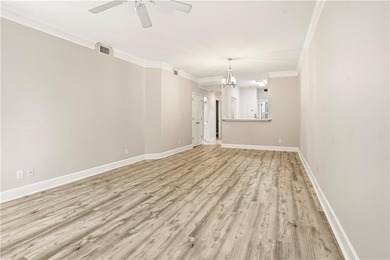 This beautifully updated first-floor, end-unit condominium on The King and Prince Golf Course, Home of the Hampton Club in Georgia - for sale on GolfHomes.com, golf home, golf lot