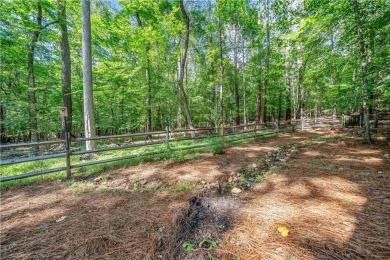 Nestled on a quiet, .38-acre cul-de-sac lot in the highly on Canongate At Eagle Watch Golf Club in Georgia - for sale on GolfHomes.com, golf home, golf lot