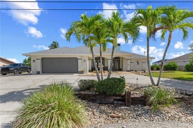 ***Rare Find! Stunning Lakefront Pool Home in SE Cape Coral - A on El Rio Golf Course and Club in Florida - for sale on GolfHomes.com, golf home, golf lot