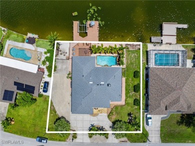 ***Rare Find! Stunning Lakefront Pool Home in SE Cape Coral - A on El Rio Golf Course and Club in Florida - for sale on GolfHomes.com, golf home, golf lot