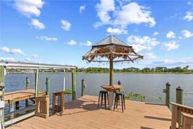 ***Rare Find! Stunning Lakefront Pool Home in SE Cape Coral - A on El Rio Golf Course and Club in Florida - for sale on GolfHomes.com, golf home, golf lot