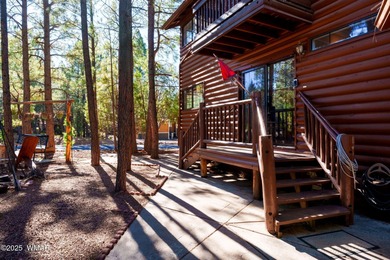 Tucked among towering pines, this inviting cabin offers the calm on Torreon Golf Club in Arizona - for sale on GolfHomes.com, golf home, golf lot