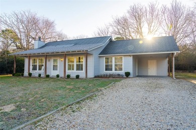 Beautifully maintained home located within the gated resort on Holly Lake Ranch Golf Club in Texas - for sale on GolfHomes.com, golf home, golf lot