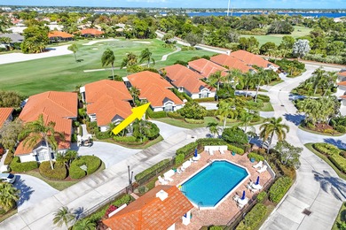 Tucked within the intimate enclave of Fig Tree Village, this on Harbour Ridge Yacht and Country Club in Florida - for sale on GolfHomes.com, golf home, golf lot