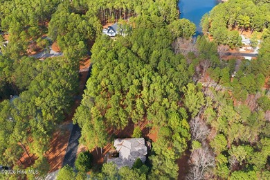 Beautiful 0.86-acre homesite in the gated community of Pinewild on Pinewild Country Club of Pinehurst in North Carolina - for sale on GolfHomes.com, golf home, golf lot