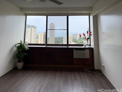 Updated, move-in-ready, 2 bedrooms / 2 bathrooms / 2 covered on Ala Wai Golf Course in Hawaii - for sale on GolfHomes.com, golf home, golf lot