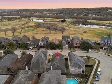 Located in a private, gated golf course community, this charming on WaterChase Golf Club in Texas - for sale on GolfHomes.com, golf home, golf lot