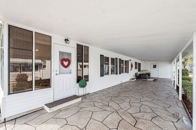 Welcome home to this beautifully updated 2-bedroom, 2-bath on Lake Henry Golf Club in Florida - for sale on GolfHomes.com, golf home, golf lot