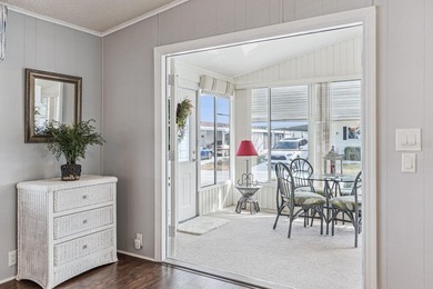 Welcome home to this beautifully updated 2-bedroom, 2-bath on Lake Henry Golf Club in Florida - for sale on GolfHomes.com, golf home, golf lot