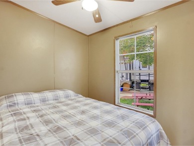 On a generous lot in Apple Island Resort, this furnished on Apple Island Golf Course At Apple Island Resort in Vermont - for sale on GolfHomes.com, golf home, golf lot