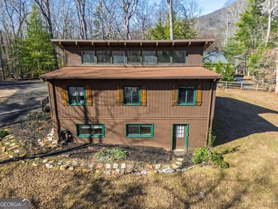 Welcome to 455 Tamarack Drive, a light-filled mountain retreat on Bent Tree Golf Course in Georgia - for sale on GolfHomes.com, golf home, golf lot