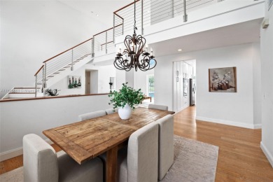 Welcome to this luxurious home featuring soaring ceilings on Weston Hills Country Club in Florida - for sale on GolfHomes.com, golf home, golf lot