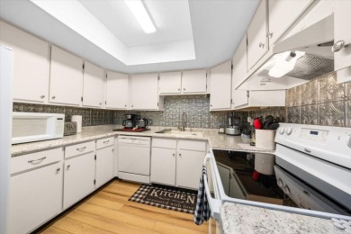 Spectacular UPDATED Lakefront 55+ Condo!  Fabulous views of Lake on Country Club At Silver Springs Shores in Florida - for sale on GolfHomes.com, golf home, golf lot