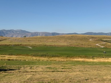 Beautiful golf course lot totaling 26,506 sq. ft. at The Powder on The Powder Horn Golf Club - Mountain in Wyoming - for sale on GolfHomes.com, golf home, golf lot