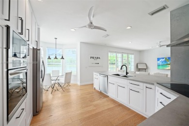 Welcome to this luxurious home featuring soaring ceilings on Weston Hills Country Club in Florida - for sale on GolfHomes.com, golf home, golf lot