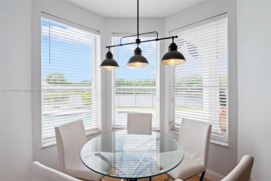 Welcome to this luxurious home featuring soaring ceilings on Weston Hills Country Club in Florida - for sale on GolfHomes.com, golf home, golf lot