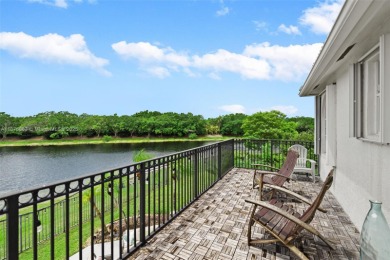 Welcome to this luxurious home featuring soaring ceilings on Weston Hills Country Club in Florida - for sale on GolfHomes.com, golf home, golf lot