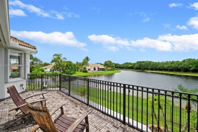 Welcome to this luxurious home featuring soaring ceilings on Weston Hills Country Club in Florida - for sale on GolfHomes.com, golf home, golf lot