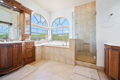 Welcome to this luxurious home featuring soaring ceilings on Weston Hills Country Club in Florida - for sale on GolfHomes.com, golf home, golf lot