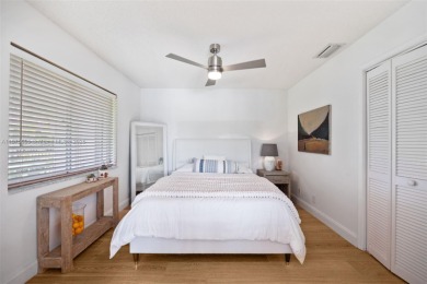 Welcome to this luxurious home featuring soaring ceilings on Weston Hills Country Club in Florida - for sale on GolfHomes.com, golf home, golf lot
