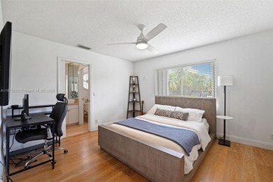 Welcome to this luxurious home featuring soaring ceilings on Weston Hills Country Club in Florida - for sale on GolfHomes.com, golf home, golf lot