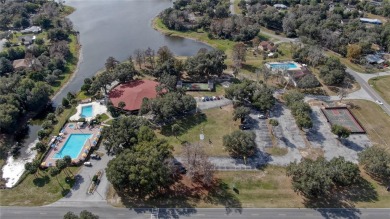 Spectacular UPDATED Lakefront 55+ Condo!  Fabulous views of Lake on Country Club At Silver Springs Shores in Florida - for sale on GolfHomes.com, golf home, golf lot