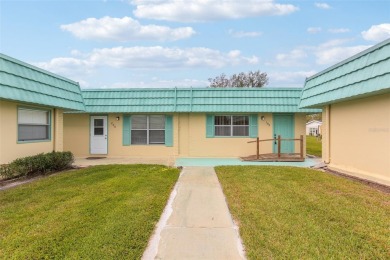 Under contract-accepting backup offers. Affordable end unit on Kings Point Executive Golf Course in Florida - for sale on GolfHomes.com, golf home, golf lot