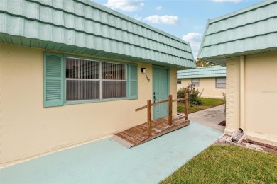 Under contract-accepting backup offers. Affordable end unit on Kings Point Executive Golf Course in Florida - for sale on GolfHomes.com, golf home, golf lot
