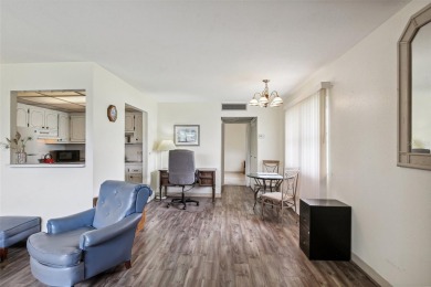 Under contract-accepting backup offers. Affordable end unit on Kings Point Executive Golf Course in Florida - for sale on GolfHomes.com, golf home, golf lot