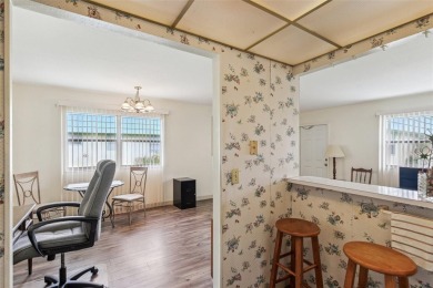 Under contract-accepting backup offers. Affordable end unit on Kings Point Executive Golf Course in Florida - for sale on GolfHomes.com, golf home, golf lot