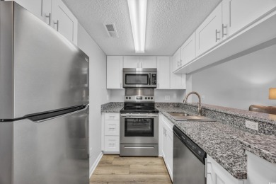 Welcome to your dream beach retreat! This beautifully remodeled on Possum Trot Golf Course in South Carolina - for sale on GolfHomes.com, golf home, golf lot