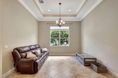 Former model home loaded with upgrades! Soaring volume ceilings on PGA Golf Club in PGA Village in Florida - for sale on GolfHomes.com, golf home, golf lot