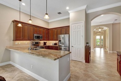 Former model home loaded with upgrades! Soaring volume ceilings on PGA Golf Club in PGA Village in Florida - for sale on GolfHomes.com, golf home, golf lot