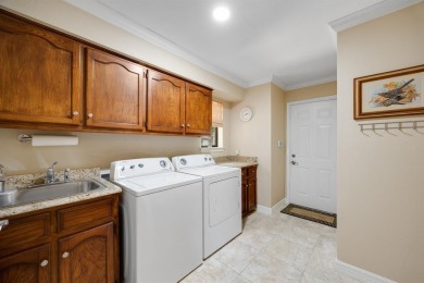 This wonderful property located in The Shores is situated on the on The Shores Country Club in Texas - for sale on GolfHomes.com, golf home, golf lot