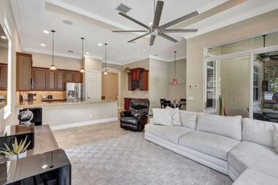 Former model home loaded with upgrades! Soaring volume ceilings on PGA Golf Club in PGA Village in Florida - for sale on GolfHomes.com, golf home, golf lot