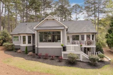 Discover the perfect blend of comfort and convenience with this on Great Waters Course At Reynolds Plantation in Georgia - for sale on GolfHomes.com, golf home, golf lot