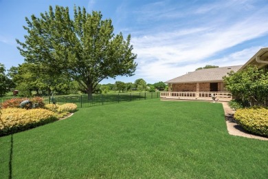This wonderful property located in The Shores is situated on the on The Shores Country Club in Texas - for sale on GolfHomes.com, golf home, golf lot
