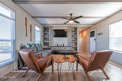 Step into this beautifully decorated, like-new 2024 home located on Silver Creek Golf Club in Arizona - for sale on GolfHomes.com, golf home, golf lot