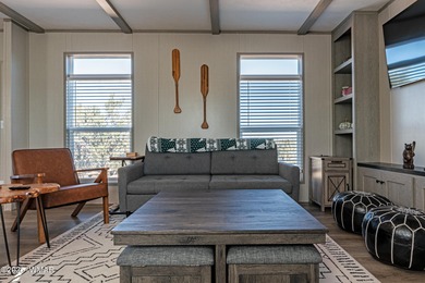 Step into this beautifully decorated, like-new 2024 home located on Silver Creek Golf Club in Arizona - for sale on GolfHomes.com, golf home, golf lot