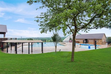 This wonderful property located in The Shores is situated on the on The Shores Country Club in Texas - for sale on GolfHomes.com, golf home, golf lot