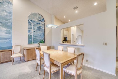 Second-floor 2-bedroom, 2-bath condo with an expansive on PGA National Golf Club in Florida - for sale on GolfHomes.com, golf home, golf lot