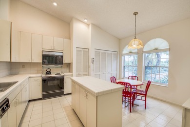 Second-floor 2-bedroom, 2-bath condo with an expansive on PGA National Golf Club in Florida - for sale on GolfHomes.com, golf home, golf lot