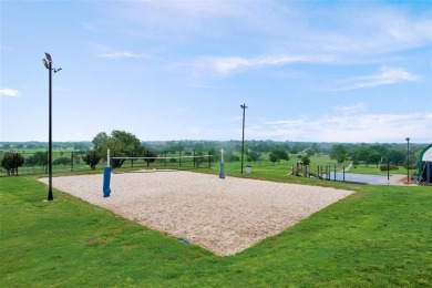 This wonderful property located in The Shores is situated on the on The Shores Country Club in Texas - for sale on GolfHomes.com, golf home, golf lot