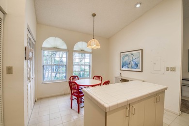 Second-floor 2-bedroom, 2-bath condo with an expansive on PGA National Golf Club in Florida - for sale on GolfHomes.com, golf home, golf lot