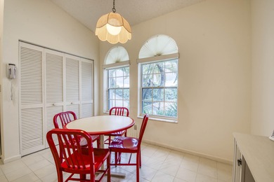 Second-floor 2-bedroom, 2-bath condo with an expansive on PGA National Golf Club in Florida - for sale on GolfHomes.com, golf home, golf lot