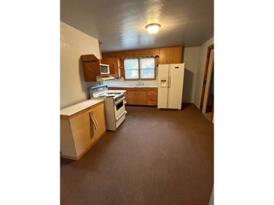 This 3 bedroom bungalow is located just one block from the city on Holstein Country Club in Iowa - for sale on GolfHomes.com, golf home, golf lot