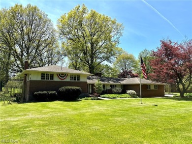 Welcome to this elegant mid-century split level nicely situated on Trumbull Country Club in Ohio - for sale on GolfHomes.com, golf home, golf lot