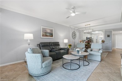 Turnkey Updated 2+Den End Unit with Golf & Lake Views | TPC on TPC At Treviso Bay in Florida - for sale on GolfHomes.com, golf home, golf lot