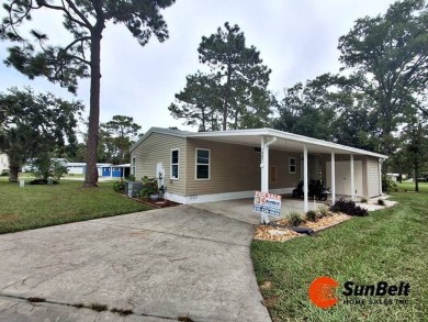 Charming 2 Bedroom / 2 Bath BARR Home in Rolling Greens Village on Rolling Greens Executive Golf Community in Florida - for sale on GolfHomes.com, golf home, golf lot