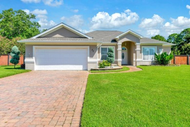 33 E Country Club Drive offers luxurious indoor living as well on Indian Bayou Golf and Country Club in Florida - for sale on GolfHomes.com, golf home, golf lot